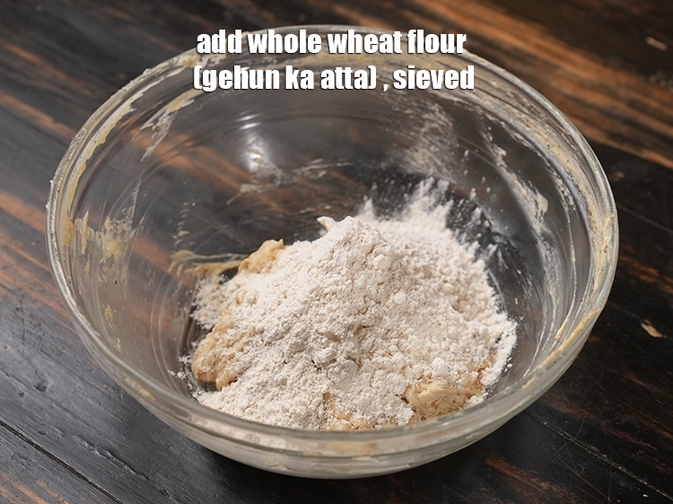 Step 18 – <p>Add <span style="background-color:rgb(255,255,255);color:rgb(0,0,0);">4 tbsp. </span><a href="https://www.tarladalal.com/glossary-whole-wheat-flour-gehun-ka-atta-gehun-ka-aata-429i"><u>whole wheat flour (gehun ka atta) </u></a><span style="background-color:rgb(255,255,255);color:rgb(0,0,0);">, sieved.</span></p>