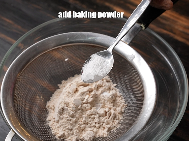 Step 3 – <p><span style="background-color:rgb(255,255,255);color:rgb(0,0,0);">Add 1/2 tsp </span><a href="https://www.tarladalal.com/glossary-baking-powder-425i"><u>baking powder</u></a>.</p>