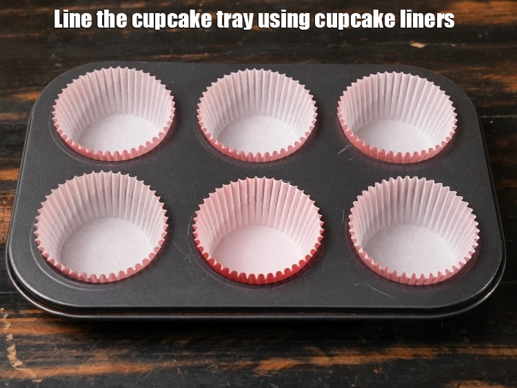 Step 21 – <p><span style="background-color:rgb(255,255,255);color:rgb(0,0,0);">Line the cupcake tray using cupcake liners.</span></p>