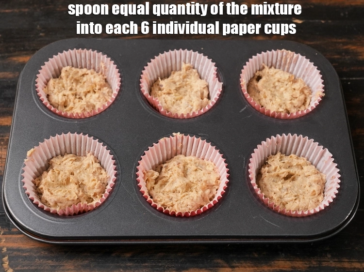 Step 22 – <p><span style="background-color:rgb(255,255,255);color:rgb(34,34,34);font-family:Arial, Helvetica, sans-serif;">Spoon equal quantity of the mixture into each 6 individual paper cups.</span></p>