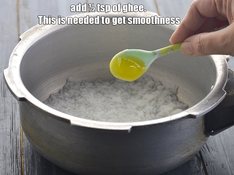 Step 17 – <p>Add ½ tsp of <a href="https://www.tarladalal.com/glossary-ghee-245i"><u>ghee</u></a>. This is needed to get smoothness to <strong>Rice Mash …