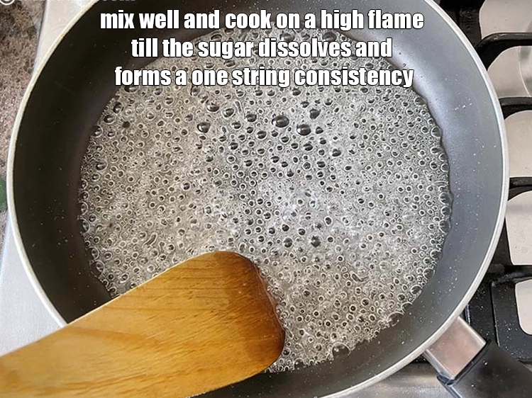 Step 9 – <p><span style="background-color:rgb(255,255,255);color:rgb(0,0,0);">Mix well and cook on a high flame till the sugar dissolves and forms …