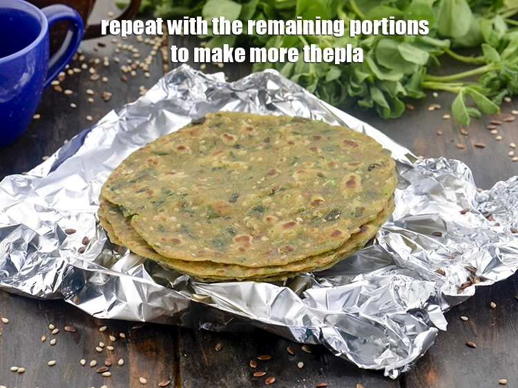 Step 19 – <p>Repeat with the remaining portions to make more <strong>thepla</strong>.</p>