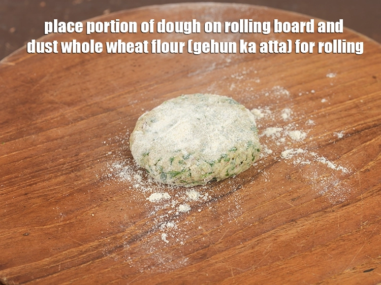 Step 15 – <p>Place portion of dough on rolling board and dust <a href="https://www.tarladalal.com/glossary-whole-wheat-flour-gehun-ka-atta-gehun-ka-aata-429i">whole wheat flour (gehun ka …