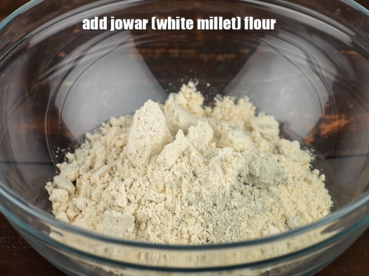 Step 5 – <p>Add 2 tbsp&nbsp;<a href="https://www.tarladalal.com/glossary-jowar-flour-jowar-ka-atta-white-millet-flour-sorghum-flour-483i">jowar (white millet) flour</a>.&nbsp;</p>