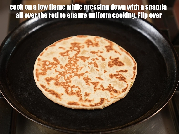 Step 21 – <p><span style="background-color:rgb(255,255,255);color:rgb(0,0,0);">Cook on a low flame for 90 seconds &nbsp;while pressing down with a spatula …