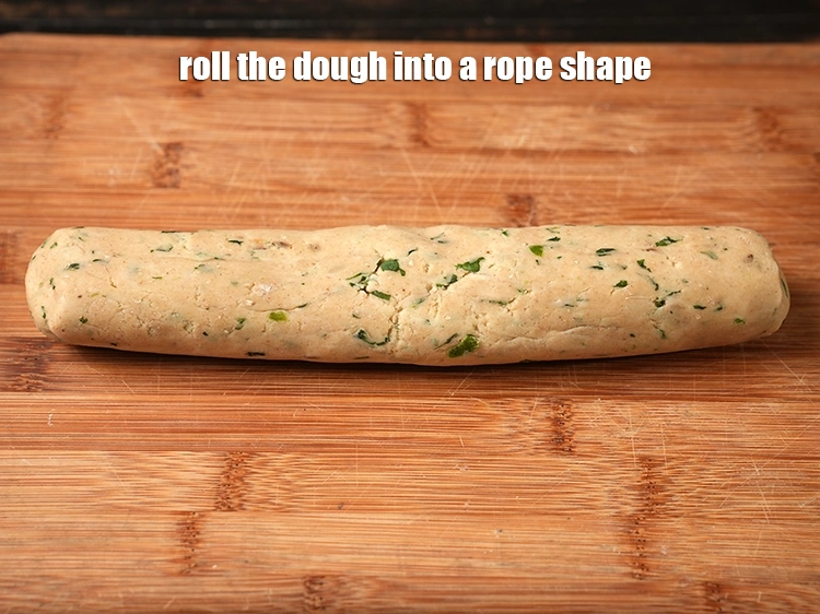 Step 12 – <p>Roll the dough into a <strong>rope shape</strong>. This makes it easy to divide the dough …