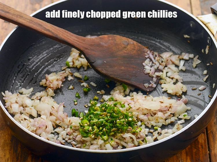 Step 14 – <p>Add <span style="background-color:rgb(255,255,255);color:rgb(0,0,0);">1 tsp finely </span><a href="https://www.tarladalal.com/glossary-green-chillies-hari-mirch-331i#ing_2388"><u>chopped green chillies</u></a>.</p>