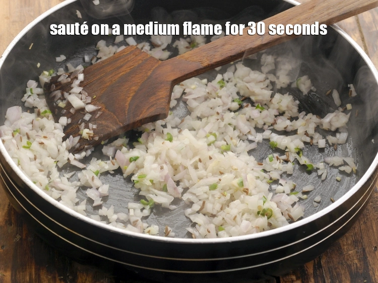 Step 15 – <p>Sauté on a medium flame for 30 seconds. Add more or fewer chillies to suit …