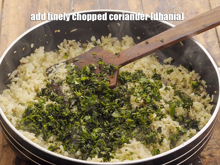 Step 20 – <p>Add the <span style="background-color:rgb(255,255,255);color:rgb(0,0,0);">1/4 cup finely </span><a href="https://www.tarladalal.com/glossary-coriander-dhania-kothmir-369i#ing_2365"><u>chopped coriander (dhania)</u></a>.</p>