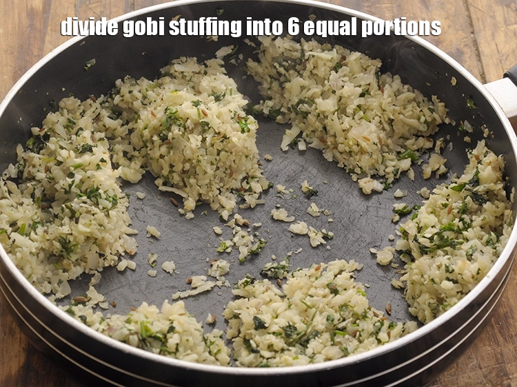 Step 32 – <p>Divide the <strong>gobi stuffing</strong> into 6 equal portions. Keep aside.</p>