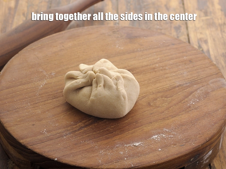 Step 27 – <p>Bring together all the sides in the center.</p>