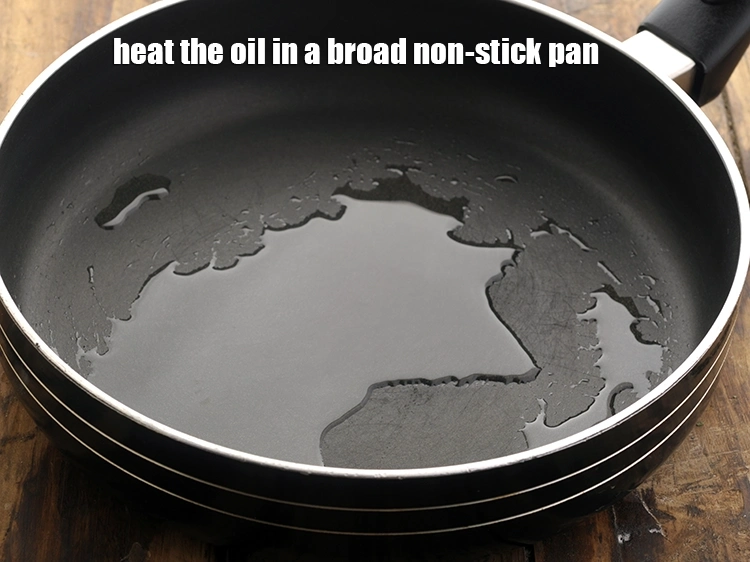 Step 11 – <p>For making the gobi stuffing, heat the <span style="background-color:rgb(255,255,255);color:rgb(0,0,0);">2 tsp </span><a href="https://www.tarladalal.com/glossary-oil-671i"><u>oil</u></a> in a broad …