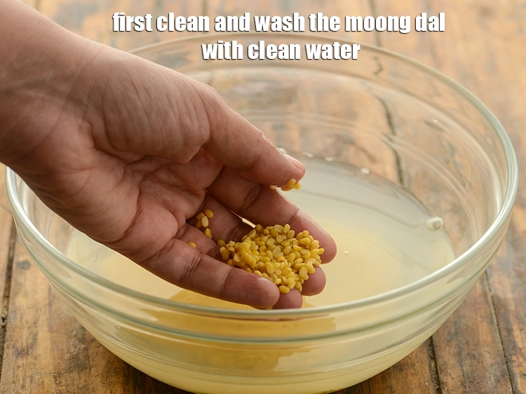 Step 9 – <p><span style="background-color:rgb(255,255,255);color:rgb(0,0,0);">first clean and wash the <strong>moong dal</strong> with clean water.</span></p>