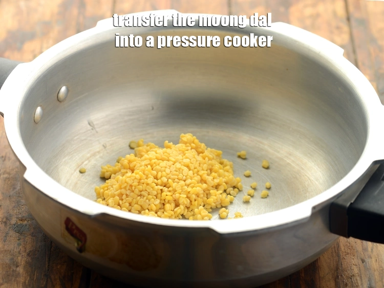 Step 11 – <p>Transfer the <span style="background-color:rgb(255,255,255);color:rgb(0,0,0);">2 tbsp </span><a href="https://www.tarladalal.com/glossary-yellow-moong-dal-split-yellow-gram-peeli-moong-dal-488i"><u>yellow moong dal (split yellow gram)</u></a> into a pressure …