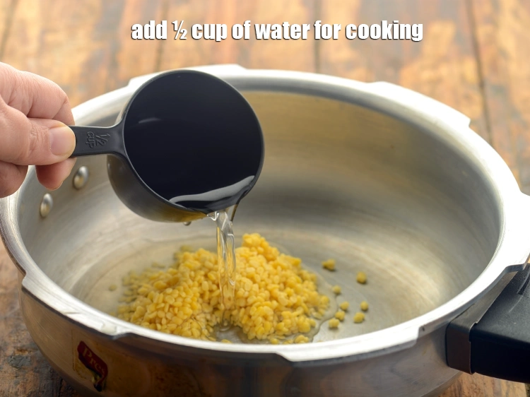 Step 12 – <p>Add ½ cup of <strong>water</strong> for cooking.</p>