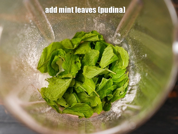 Step 3 – <p>Add <span style="background-color:rgb(255,255,255);color:rgb(0,0,0);">1/2 cup </span><a href="https://www.tarladalal.com/glossary-mint-leaves-pudina-phudina-521i"><u>mint leaves (pudina)</u></a><u>.</u></p>