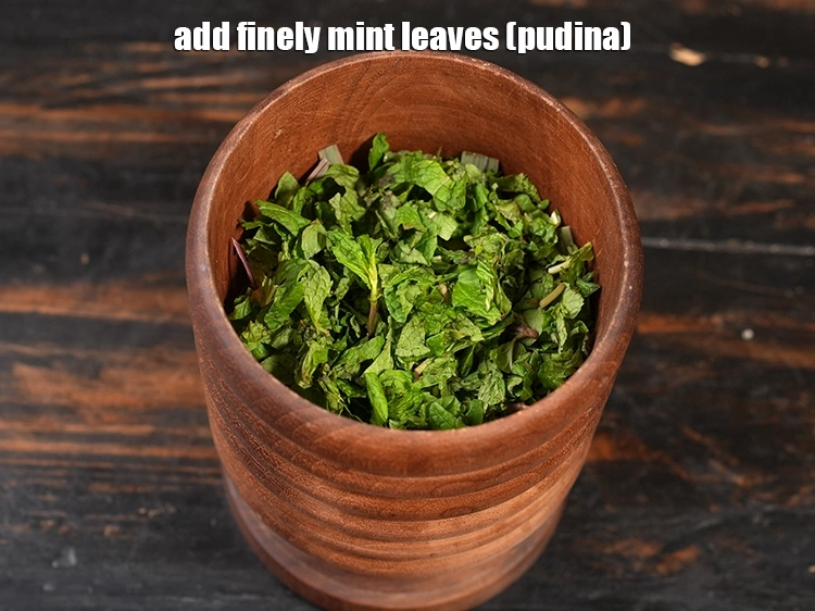 Step 4 – <p>Add ¼ cup finely <a href="https://www.tarladalal.com/glossary-mint-leaves-pudina-phudina-521i">mint leaves (pudina)</a>. Mint imparts the refreshing menthol flavour that …