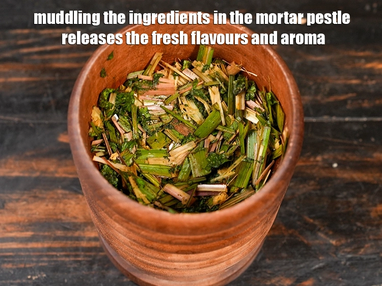 Step 14 – <p><strong>Muddling</strong> the ingredients in the mortar pestle releases the fresh flavours and aroma.</p>