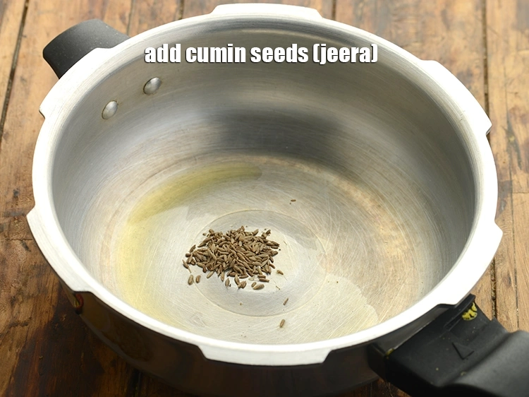 Step 11 – <p>Add the <span style="background-color:rgb(255,255,255);color:rgb(0,0,0);">1/2 tsp </span><a href="https://www.tarladalal.com/glossary-cumin-seeds-jeera-zeera-381i"><u>cumin seeds (jeera)</u></a> and allow them to crackle.</p>