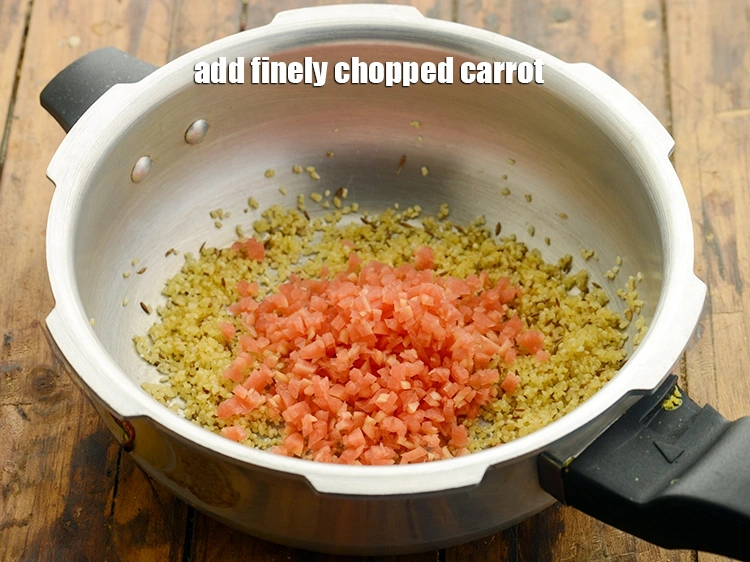 Step 14 – <p>Add the veggies now to make <strong>healthy dalia paneer pulao for kids</strong>. First add the …