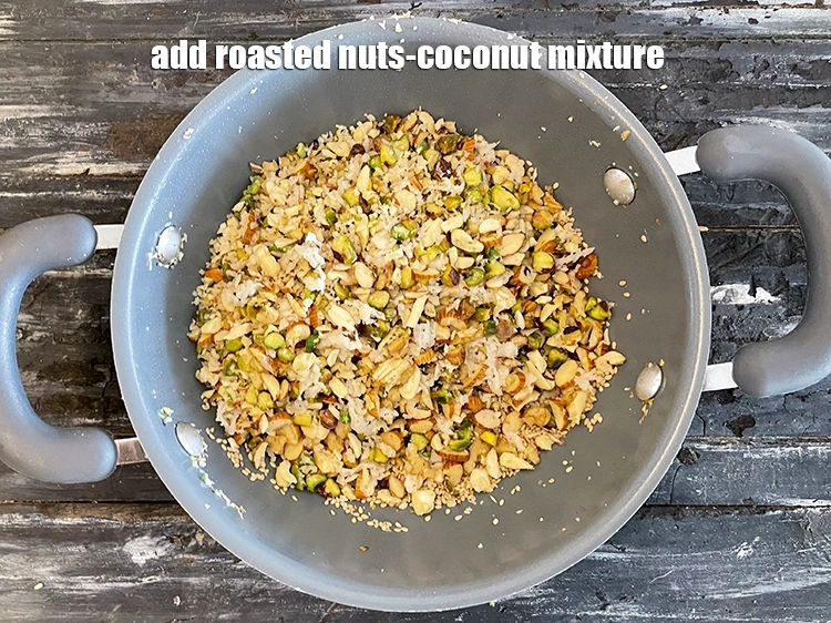 Step 21 – <p>Add the roasted nuts-coconut mixture.</p>