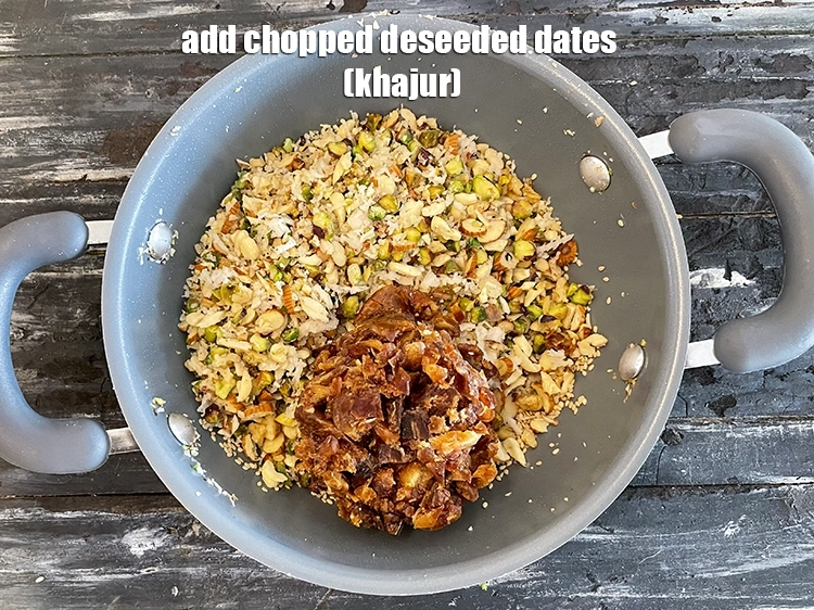 Step 22 – <html><head></head><body><p>Add&nbsp;1 cup chopped&nbsp;<a href="glossary-deseeded-dates-2672i">deseeded dates (khajur)</a>. See above on how to chop&nbsp;dates.&nbsp;</p></body></html>