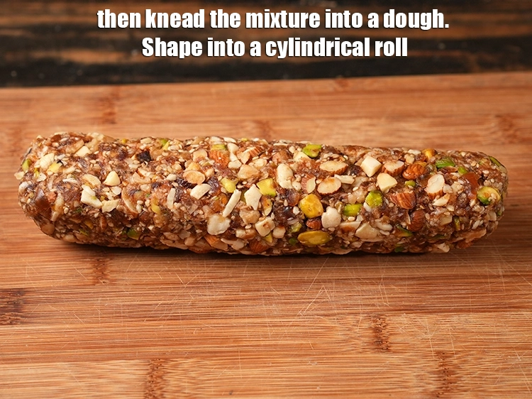 Step 27 – <p>Then knead the mixture into a <strong>dough</strong>.&nbsp;Shape into a <strong>cylindrical roll</strong> of 8" in diameter,</p>