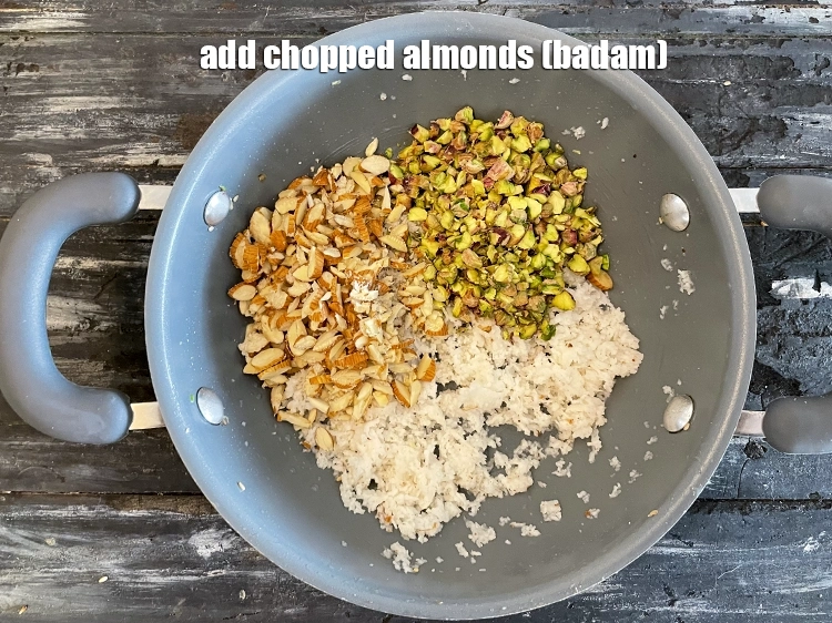 Step 14 – <html><head></head><body><p>Add&nbsp;1/3 cup&nbsp;<a href="glossary-chopped-almonds-865i">chopped almonds (badam)</a>.</p></body></html>