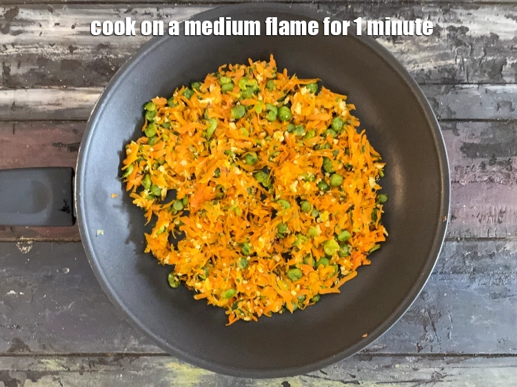 Step 14 – <p>Cook on a medium flame for 1 minute.<br>&nbsp;</p>