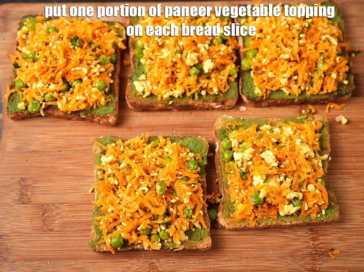 Step 20 – <p>Put one <strong>portion of paneer vegetable</strong> topping on each bread slice.</p>