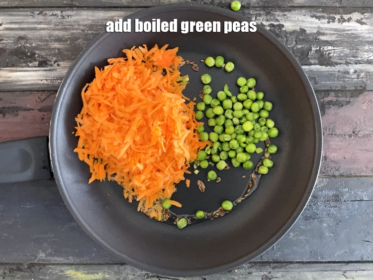 Step 8 – <html><head></head><body><p>Add&nbsp;the <span style="background-color:rgb(255,255,255);color:rgb(0,0,0);">1/4 cup </span><a href="https://www.tarladalal.com/glossary-green-peas-matar-hare-matar-vatana-180i#ing_2431"><u>boiled green peas</u></a><u>.</u></p></body></html>