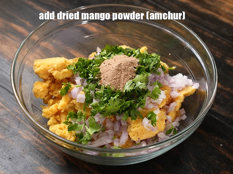Step 37 – <p><span style="background-color:rgb(255,255,255);color:rgb(0,0,0);">Add 1 tsp&nbsp;</span><a href="https://www.tarladalal.com/glossary-dried-mango-powder-amchur-powder-148i"><u>dried mango powder (amchur)</u></a><u>.</u></p>