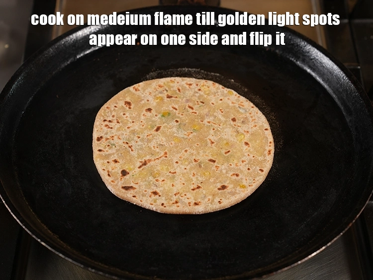 Step 49 – <p><span style="background-color:rgb(255,255,255);color:rgb(0,0,0);">Cook on medium flame till golden light spots appear on one side and flip …