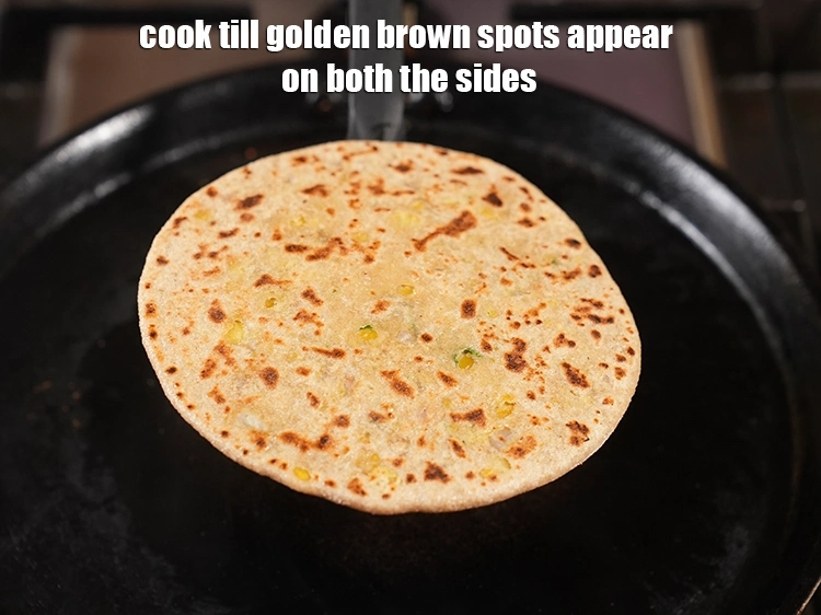 Step 62 – <p><span style="background-color:rgb(255,255,255);color:rgb(0,0,0);">Cook on both sides till golden brown in colour.</span></p>