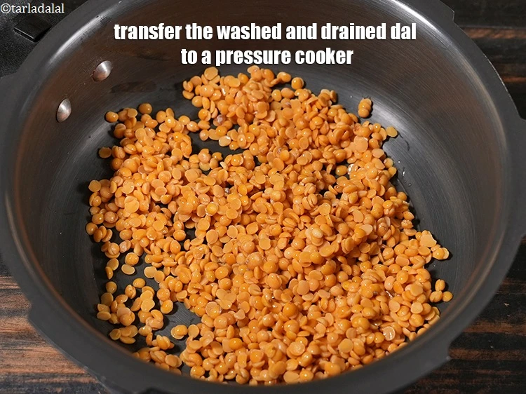 Step 16 – <p>For preparing the sambar for <strong>Sambhar Sadam</strong>, rinse the <span style="background-color:rgb(255,255,255);color:rgb(0,0,0);">1/2 cup </span><a href="https://www.tarladalal.com/glossary-toovar-dal-arhar-dal-toor-dal-split-pigeon-peas-tur-dal-955i"><u>toovar (arhar) …