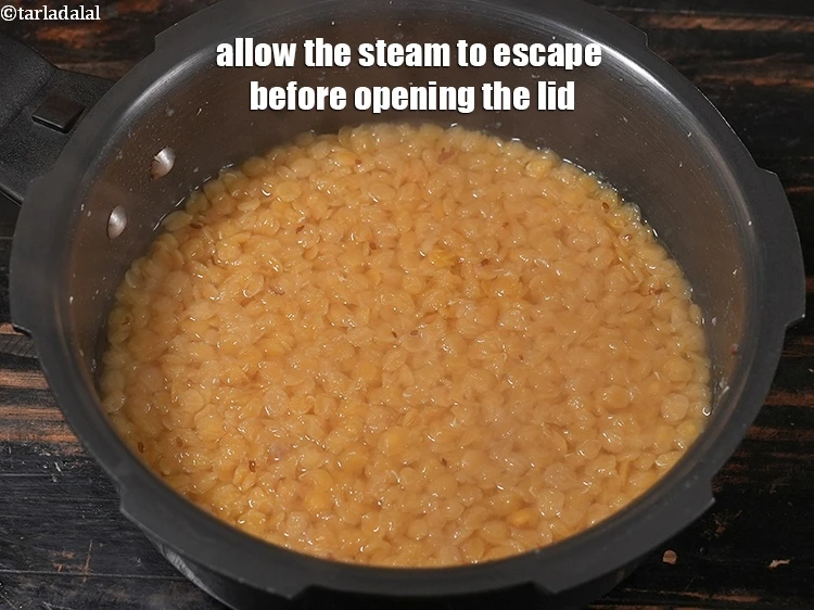 Step 21 – <p>Allow the steam to escape before opening the lid.</p>