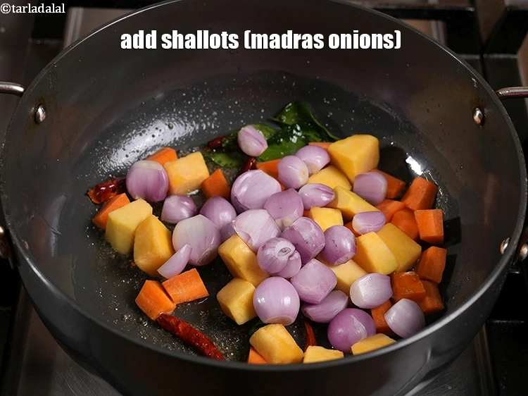 Step 31 – <p>Add 1/2 cup&nbsp;<a href="https://www.tarladalal.com/glossary-shallots-Madras-onions-827i">shallots (madras onions)</a>. If you don’t have baby onions, then chop regular …