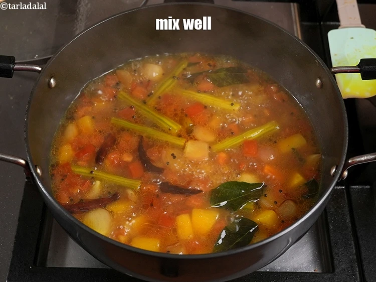 Step 41 – <p>Mix well. Check if the vegetables are cooked by piercing a knife, especially the drumstick.</p>