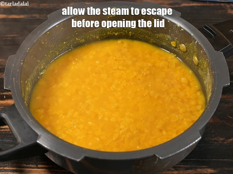 Step 13 – <p>Allow the steam to escape before opening the lid.</p>