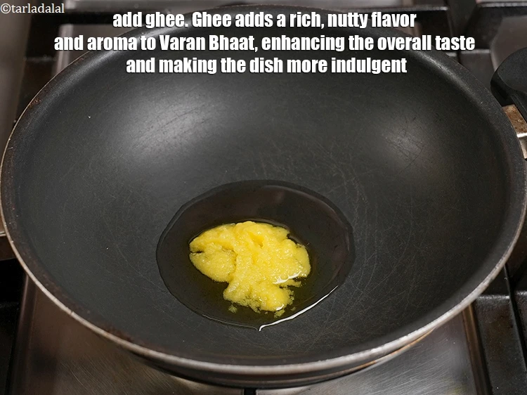 Step 16 – <p>Add 1 tbsp <a href="https://www.tarladalal.com/glossary-ghee-245i">ghee</a>. Ghee adds a rich, nutty flavor and aroma to Varan …