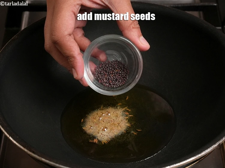 Step 18 – <p>Add ½ tsp <a href="https://www.tarladalal.com/glossary-mustard-seeds-sarson-rai-sarson-ke-beej-525i">mustard seeds ( rai / sarson)</a>.</p>