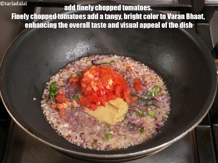 Step 25 – <p>Add ¼ cup finely <a href="https://www.tarladalal.com/glossary-chopped-tomatoes-779i">chopped tomatoes</a>. Finely chopped tomatoes add a tangy, bright color …