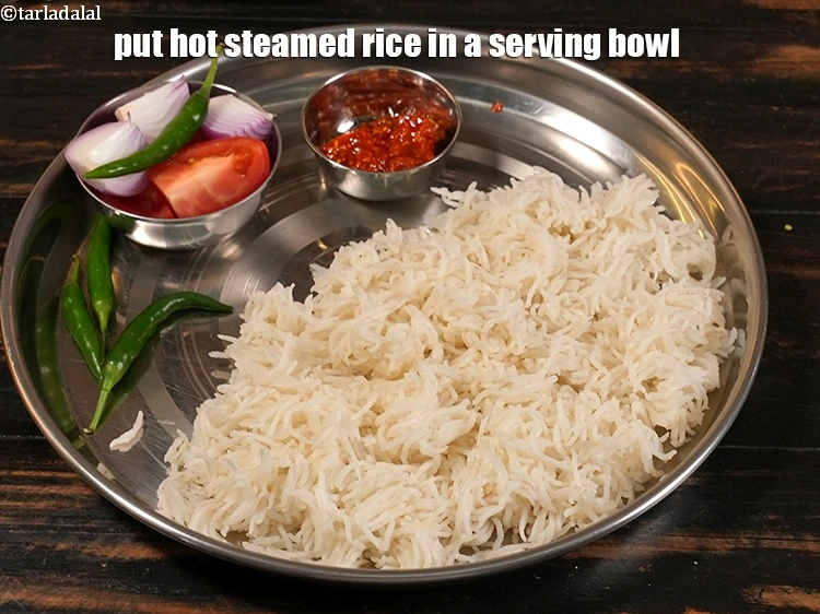 Step 32 – <p>Put 1 cup of hot steamed rice in a serving bowl.</p>