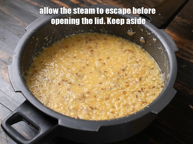 Step 18 – <p>Allow the steam to escape before opening the lid. Keep aside.</p>