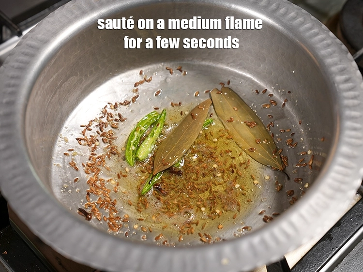 Step 25 – <p><span style="background-color:rgb(255,255,255);color:rgb(0,0,0);">Cook till the cumin seeds crackle.</span></p>