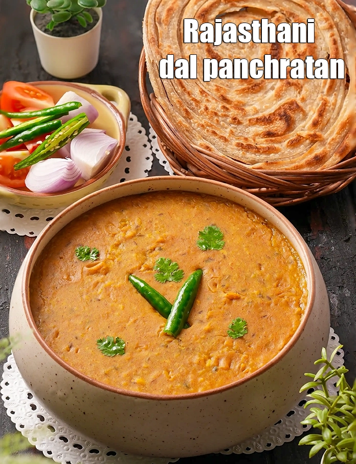 Step 35 – <html><head></head><body><p>Serve <strong>panchmel dal recipe | Rajasthani dal panchratan | pancharatna dal |</strong>&nbsp;&nbsp;immediately with <a href="https://www.tarladalal.com/green-chutney-chaat-2797r"><u>naan</u></a> …