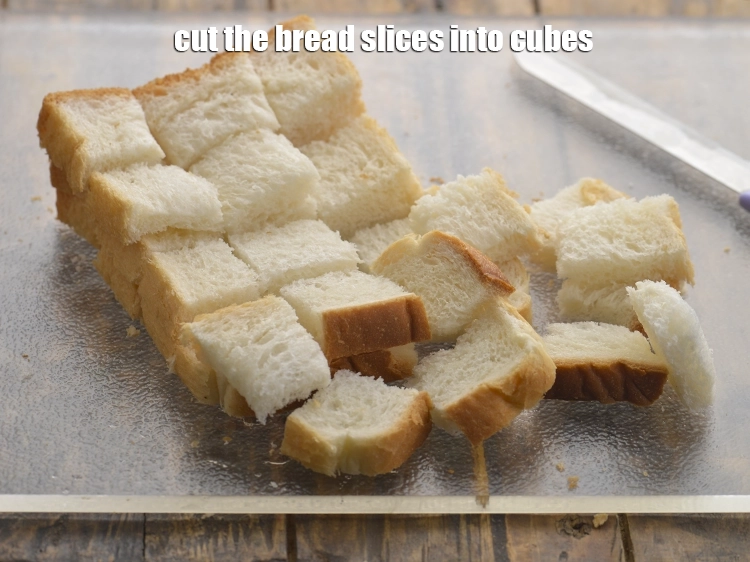 Step 2 – <p><span style="background-color:rgb(255,255,255);color:rgb(0,0,0);">Cut <strong>bread slices</strong> into cubes using a knife.</span></p>