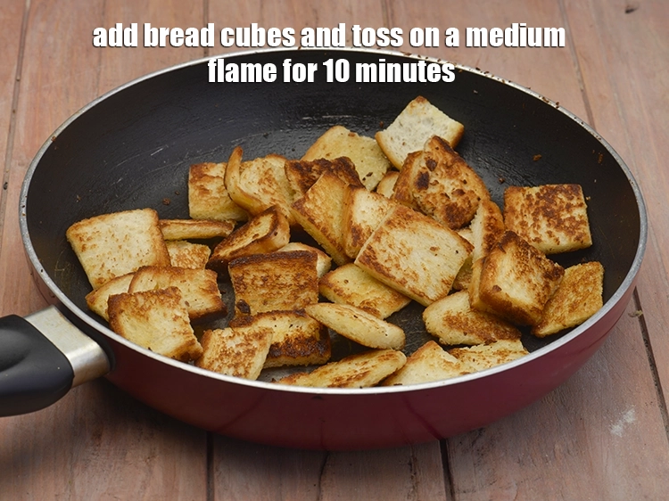 Step 4 – <p><span style="background-color:rgb(255,255,255);color:rgb(0,0,0);">Add the <strong>bread cubes</strong> and toss on a medium flame for 10 minutes.</span></p>