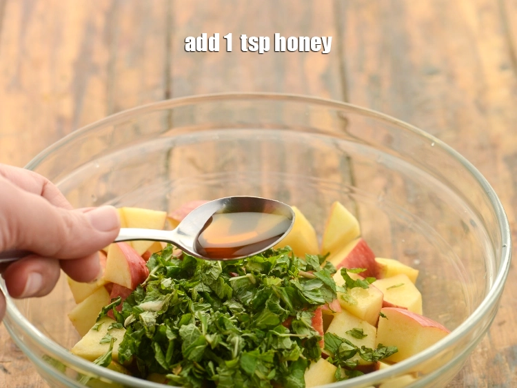 Step 23 – <p><span style="background-color:rgb(255,255,255);color:rgb(0,0,0);">Add the 1 tsp </span><a href="https://www.tarladalal.com/glossary-honey-467i"><u>honey</u></a><span style="background-color:rgb(255,255,255);color:rgb(0,0,0);">. This is optional. If the apples are …